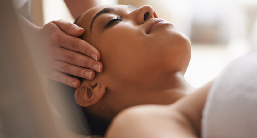 Person receiving a relaxing facial massage as part of their mind-body therapy.