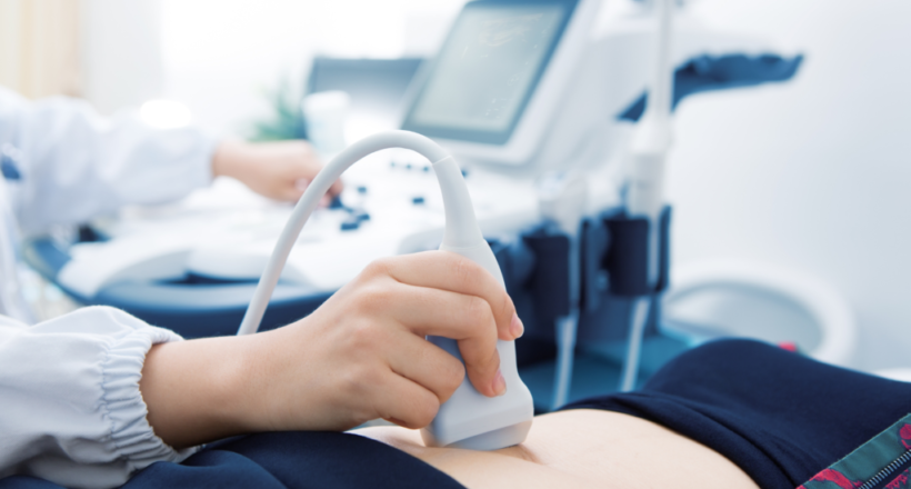 A patient receiving point-of-care ultrasound.