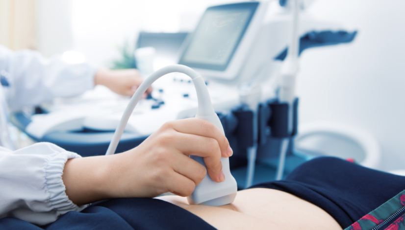 A patient receiving point-of-care ultrasound.